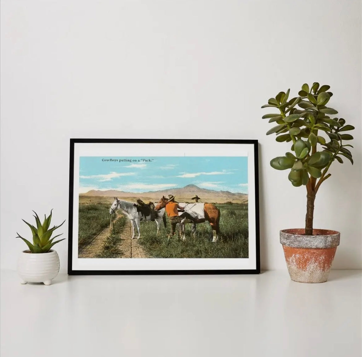 “Cowboys Putting on a Pack” print